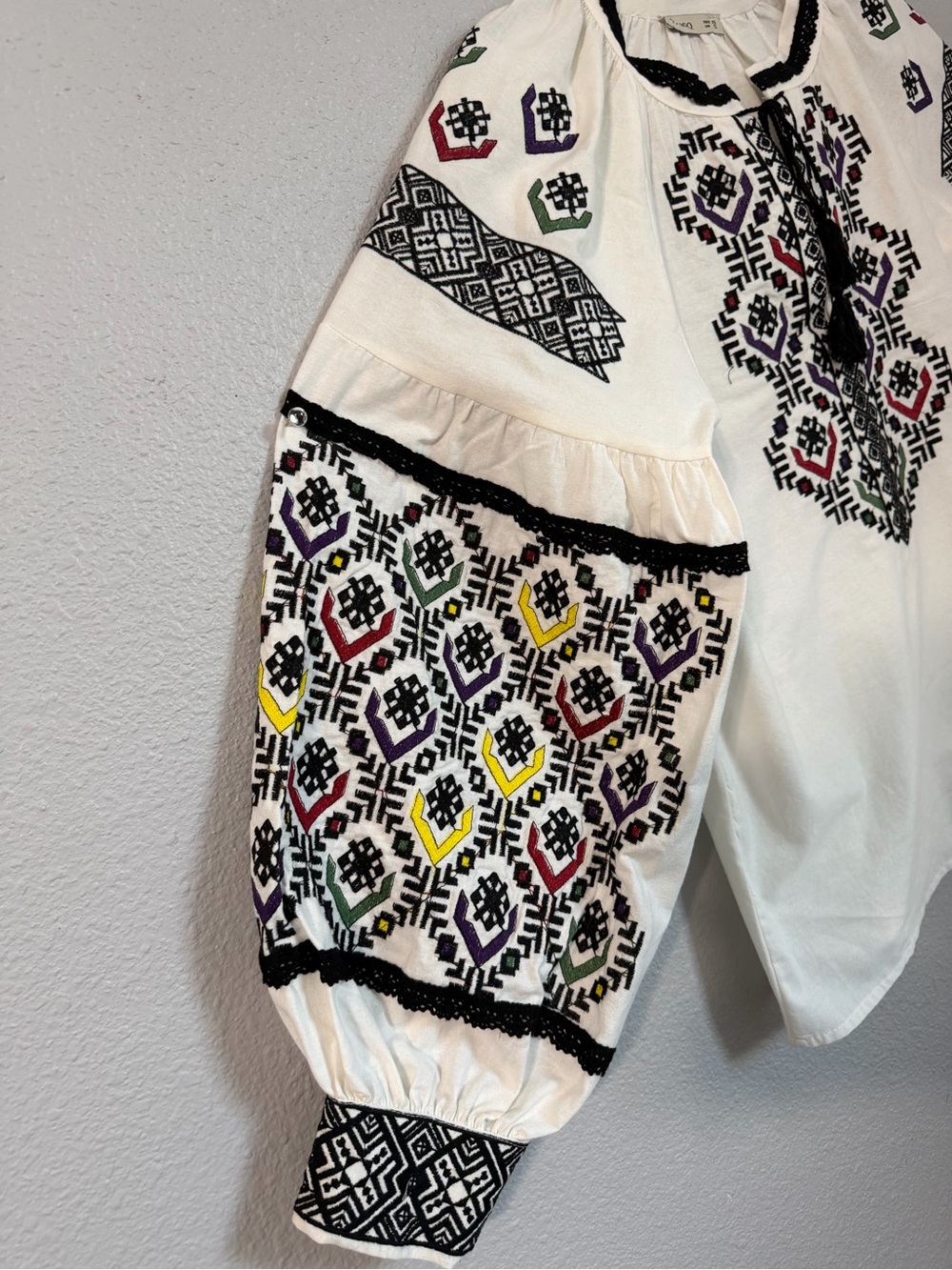 Embroidered White Peasant Blouse with Multicolor Accents - Picture 2 of 9